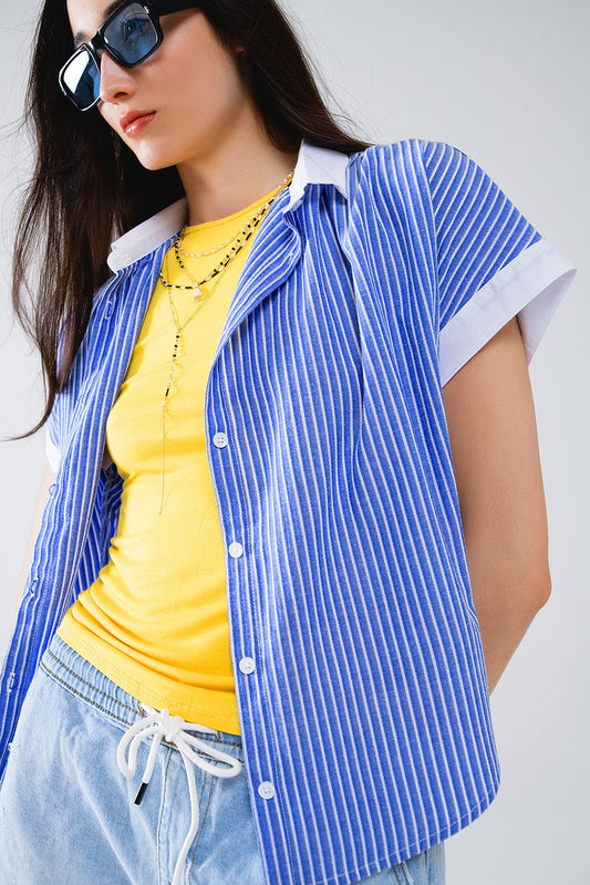 Blue shirt with short sleeves and vertical stripes