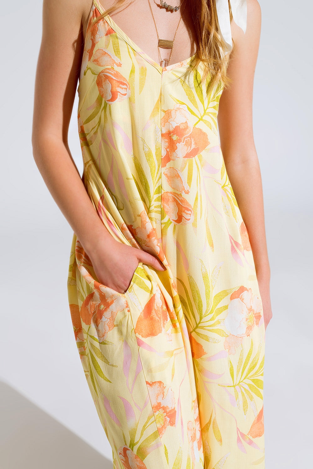 maxi yellow jumpsuit in tropical print