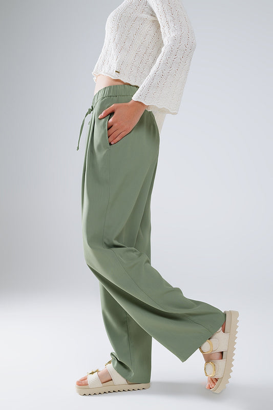 Pants In Green With Front Pockets And Drawstring Closing