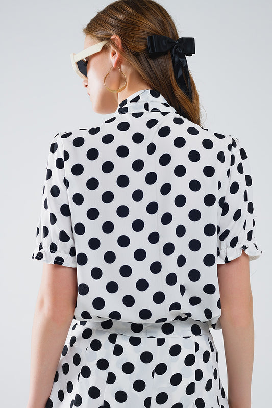 Polka dot blouse with scarf tie detail