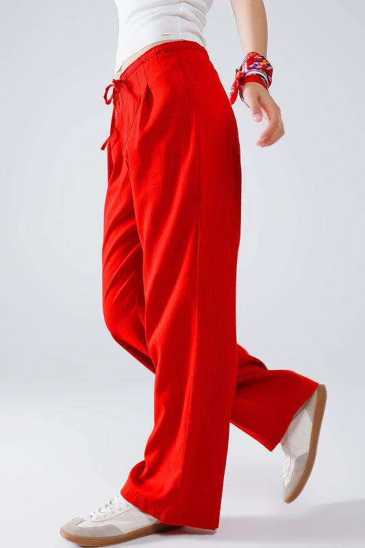 Red Relaxed Pants With Drawstring Closing And Side Pockets