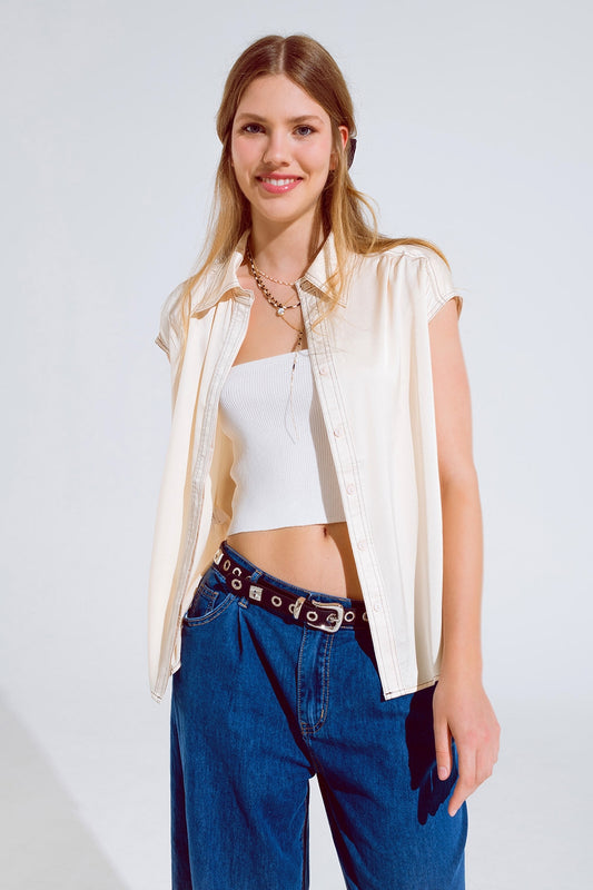 Sleeveless Blouse with pollo collar in beige