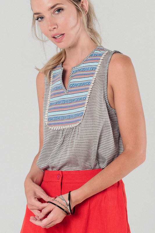 Q2 Striped gray top with multicolor front detail