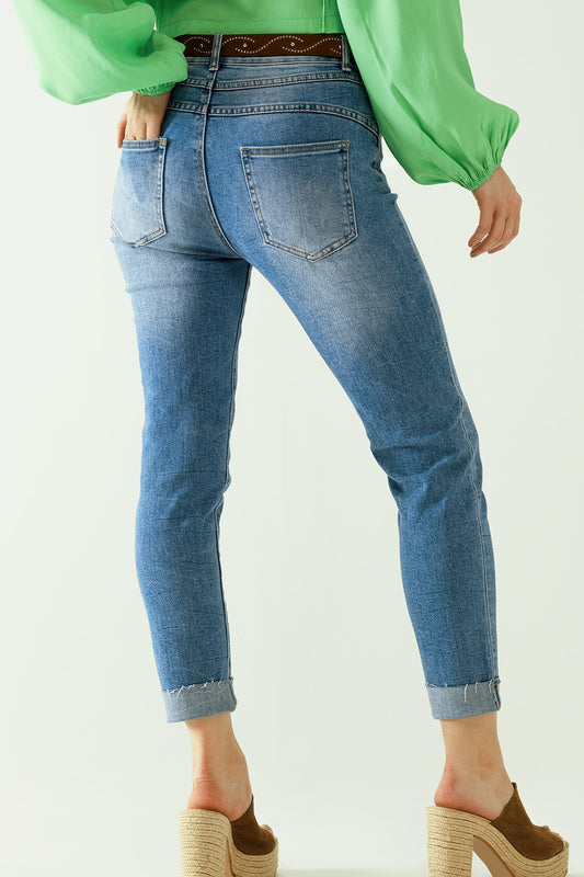 Washed effect push-up jeans with five pockets and hem