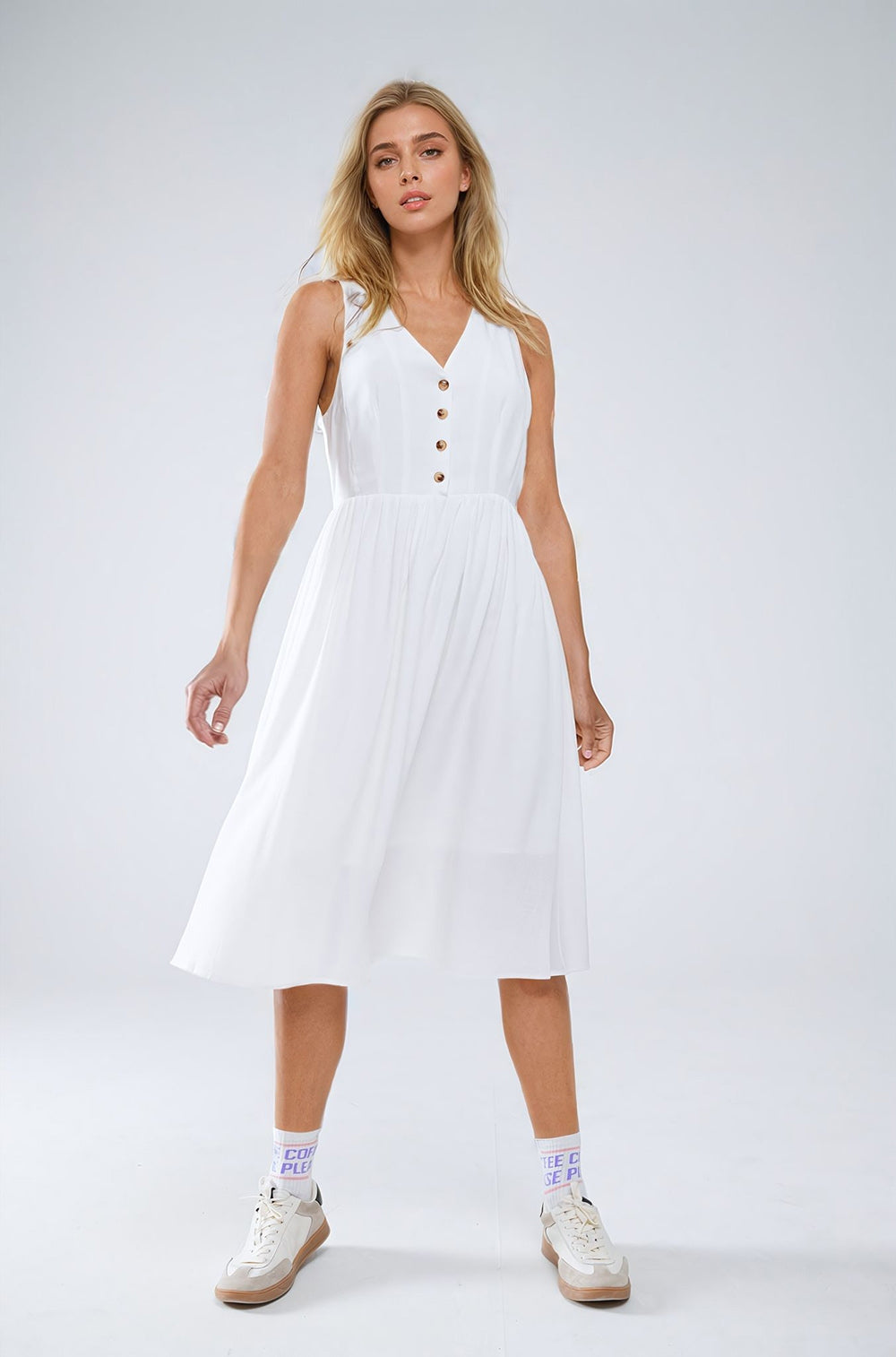 White dress with button detail