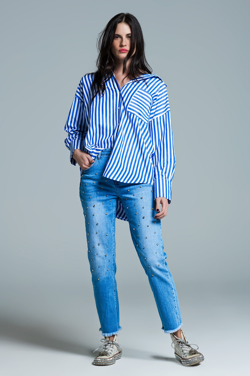 White oversized blouse with vertical stripes in blue and chest pocket